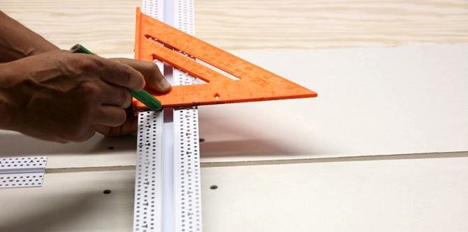 With a speed square, mark both sides of the Architectural Reveal Bead where the two beads will intersect. With a speed square, mark both sides of the Architectural Reveal Bead where the two beads will intersect.