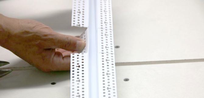 Remove the cut section of the reveal, allowing the smaller reveal to fit into the opening. Remove the cut section of the reveal, allowing the smaller reveal to fit into the opening.